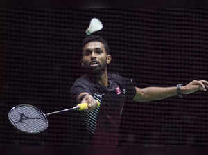 H.S. Prannoy of India plays a return during a badminton game of the men's single...