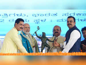 Mangaluru: Prime Minister Narendra Modi being felicitated at the foundation laying ceremony of various projects, in Mangaluru, Karnataka on Friday, Sept. 02, 2022. (Photo: PIB/IANS)