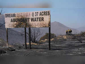 Fire crews work a wildfire on Thursday, Sept. 1, 2022, near Dulzura, Calif AP