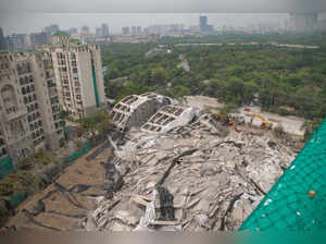 Noida: Debris of the demolished twin towers of Supertech, in Noida. Over 3,700 k...