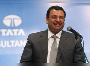 FILE PHOTO: Mistry, chairman of Tata Group, smiles during the TCS annual general meeting in Mumbai