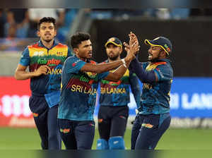 Dubai : Sri Lanka's Dilshan Madushanka, left, celebrates with teammates the dismissal of India's Deepak Hooda during the T20 cricket match of Asia Cup between Sri Lanka and India at Dubai International Stadium in Dubai on Tuesday, September 06, 2022.(Photo:Raj Kumar/IANS)