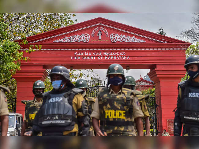 Bengaluru: Police personnel at the entrance of Karnataka High Court, in Bengalur...