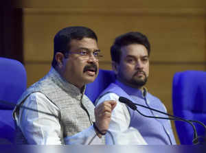 New Delhi: Union Education Minister Dharmendra Pradhan with I & B Minister Anura...