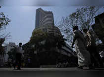 Sensex jumps over 450 points as crude prices ease