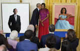 Barack & Michelle Obama return to White House to unveil official portraits