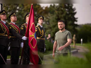 Ukraine's President Volodymyr Zelenskiy attends a raising ceremony of the country's biggest national flag to mark the Day of the State Flag in Kyiv