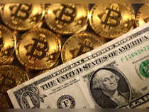 Bitcoin leaps above $21,000 as U.S. dollar sags