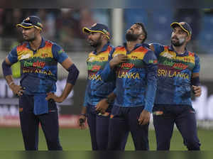 Sri Lanka's Wanindu Hasaranga de Silva, second right, reacts after the dismissal...
