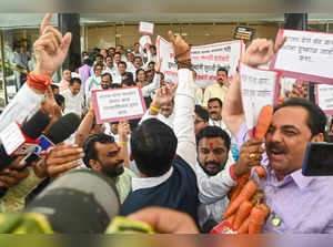 Mumbai: Opposition and rebel Shiv Sena MLAs raise slogans against each other out...