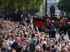 Queue fit for a queen: Thousands of mourners line up to view monarch's coffin & pay last respects to Queen Elizabeth II