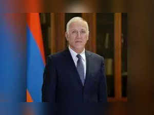 Armenia's President Vahagn Khachaturyan gets clicked while paying respects to Queen's flag-draped coffin. See details