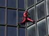 'French Spiderman' scales 48-storey skyscraper at the age of 60