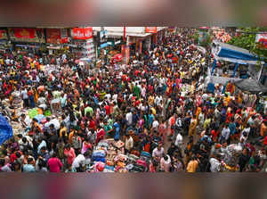 Kolkata: People shop at New Market area ahead of Durga Puja festival, in Kolkata...