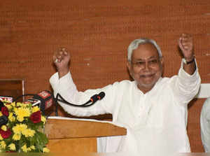 Patna: Bihar Chief Minister Nitish Kumar addresses during handing over a job letter to a beneficiary for Revenue and Land Reforms Department as Deputy CM Tejaswi Yadav looks on, at Adhiveshan Bhawan  in Patna on Tuesday, Sept. 20, 2022. (Photo: IANS)