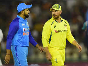 Mohali Indian captain Rohit Sharma with his Australian counterpart Aaron Finch d...