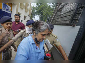 Ahmedabad: Social activist Teesta Setalvad being escorted to a session's court, ...