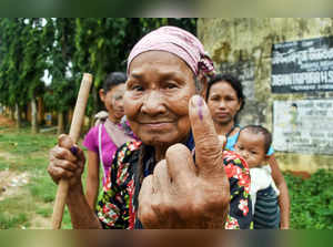 Damchara: A Reang tribal woman shows her finger marked with indelible ink after ...
