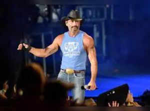 Tim McGraw stumbles off the stage while performing in Arizona