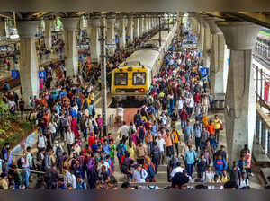 Navi Mumbai: Commuters at crowded Panvel Railway Station after trains on harbour...