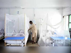 Patients affected with dengue fever are treated inside mosquito nets at a hospital in Islamabad, capital of Pakistan on Sept. 15, 2022. Pakistan's capital Islamabad has been facing a surge in dengue cases as 72 new cases were reported in the last 24 hours, amid an outbreak of the disease in the country, health authorities said. (Xinhua/Ahmad Kamal)