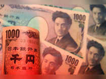 Yen propped up after intervention, dollar powers through
