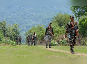 Security personnel patrol the Maoist-hit forest areas