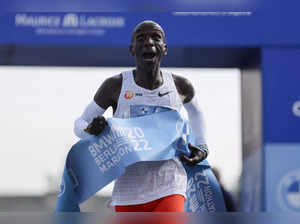 Kenya's Eliud Kipchoge crosses the line to win the Berlin Marathon in Berlin, Ge...