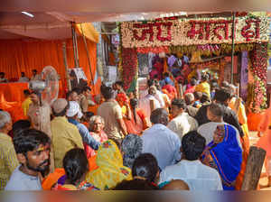 Mirzapur: Devotees wait in queues to offer prayers at Vindhyavasini temple durin...