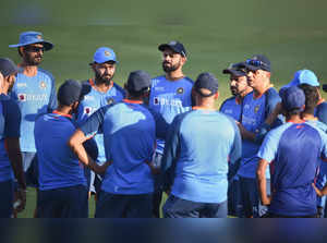 Thiruvananthapuram: Indian captain Rohit Sharma with head coach Rahul Dravid and...