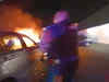 Watch: New Jersey police rescue man from burning car