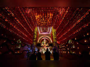 Kolkata: A community pandal during Durga Puja festival, in Kolkata. (PTI Photo) ...