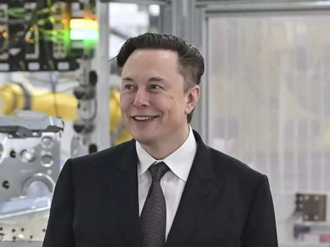 Musk previews Tesla's humanoid robot, but cautions it is not ready just yet