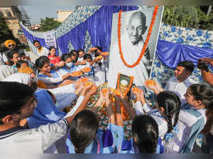 Jammu: Students pay tribute to Mahatma Gandhi on his birth anniversary, Jammu. (...