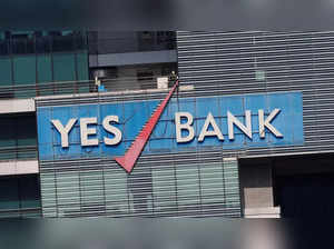 The logo of Yes Bank is pictured on the facade of its headquarters in Mumbai
