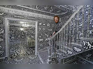 Artist Sam Cox covers his mansion worth £1.35 million in doodles. Read details here