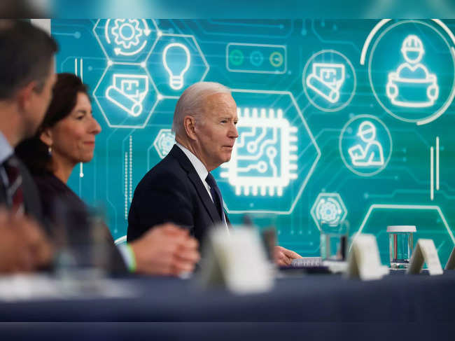 U.S. President Biden and Commerce Secretary Raimondo hold a virtual meeting with business leaders and state governors, in Washington