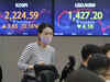 Asian shares rise, oil extends gains after OPEC+ deal
