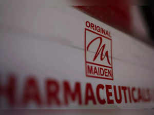 Logo of the Maiden Pharmaceuticals Ltd. company is seen on a board put up outside their office in New Delhi,.