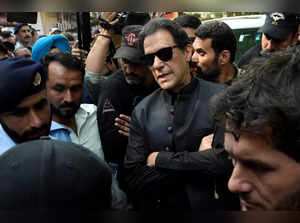 FILE PHOTO: Pakistan's former Prime Minister Imran Khan appears at a court, in Islamabad