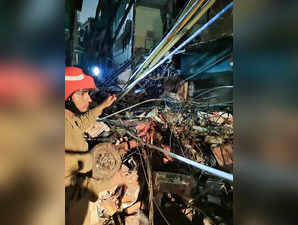 New Delhi: Rescue operation underway after a building collapsed at Lahori Gate a...