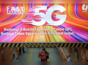 An advertisement of 5G network is displayed in Kuala Lumpur