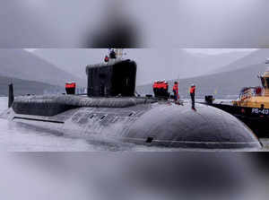 President Vladimir Putin parades Soviet-era nuclear submarine on streets of Russia