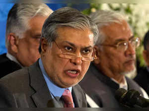 FILE PHOTO: Pakistan Finance Minister Dar announces the result of the first auction for 3G mobile phone networks during a news conference in Islamabad
