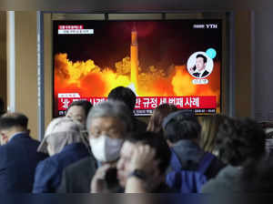 North Korea fires missile and artillery shells, say reports