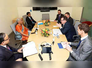 Washington DC, Oct 14 (ANI): Union Finance Minister Nirmala Sitharaman interacts...