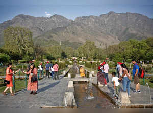 Tourists visit Nishat Garden in Srinagar