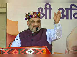 **EDS: IMAGE VIA @BJP4India** Sirmaur: Union Home Minister Amit Shah speaks duri...