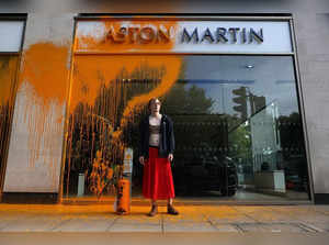 'Just Stop Oil' protesters paint Aston Martin showroom orange in London
