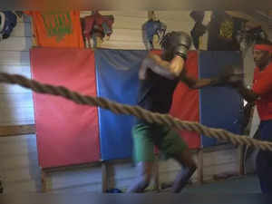 Boxing coach in Gadsden County teaches children the ropes in and out of the ring. Details here